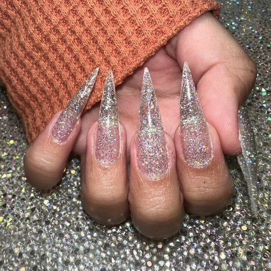 I'm Snow Cute-Non Sticky Builder Gel offers a glittery finish.
