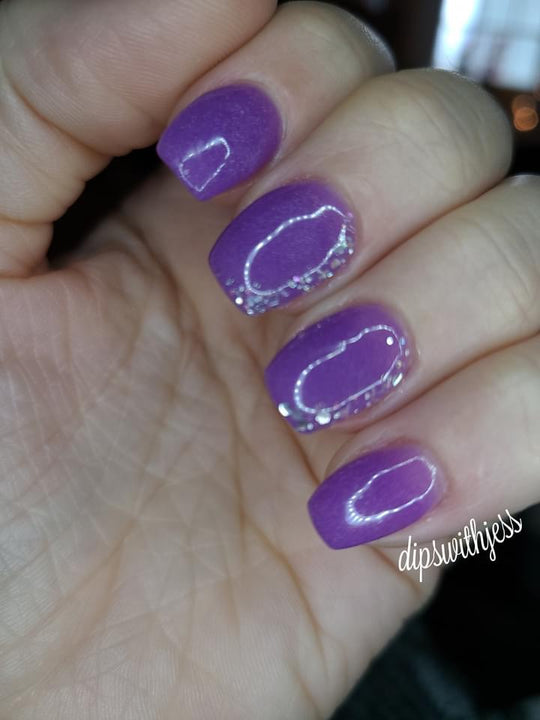 Dressed to the nines as a purple dip powder